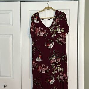 Full length flowy dress. It has pockets and a slit up to the knee on both sides